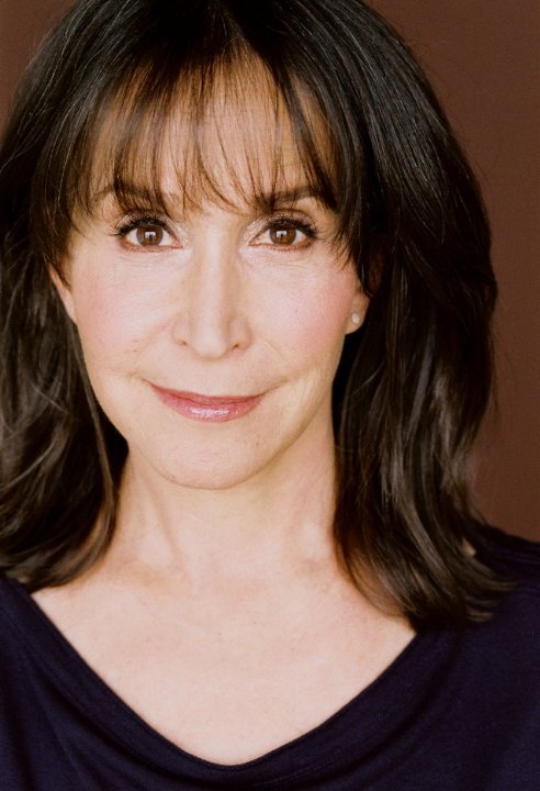 Gina Hecht — Mrs. Tucci