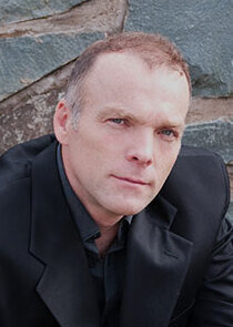 Hugh Thompson — Officer Baker