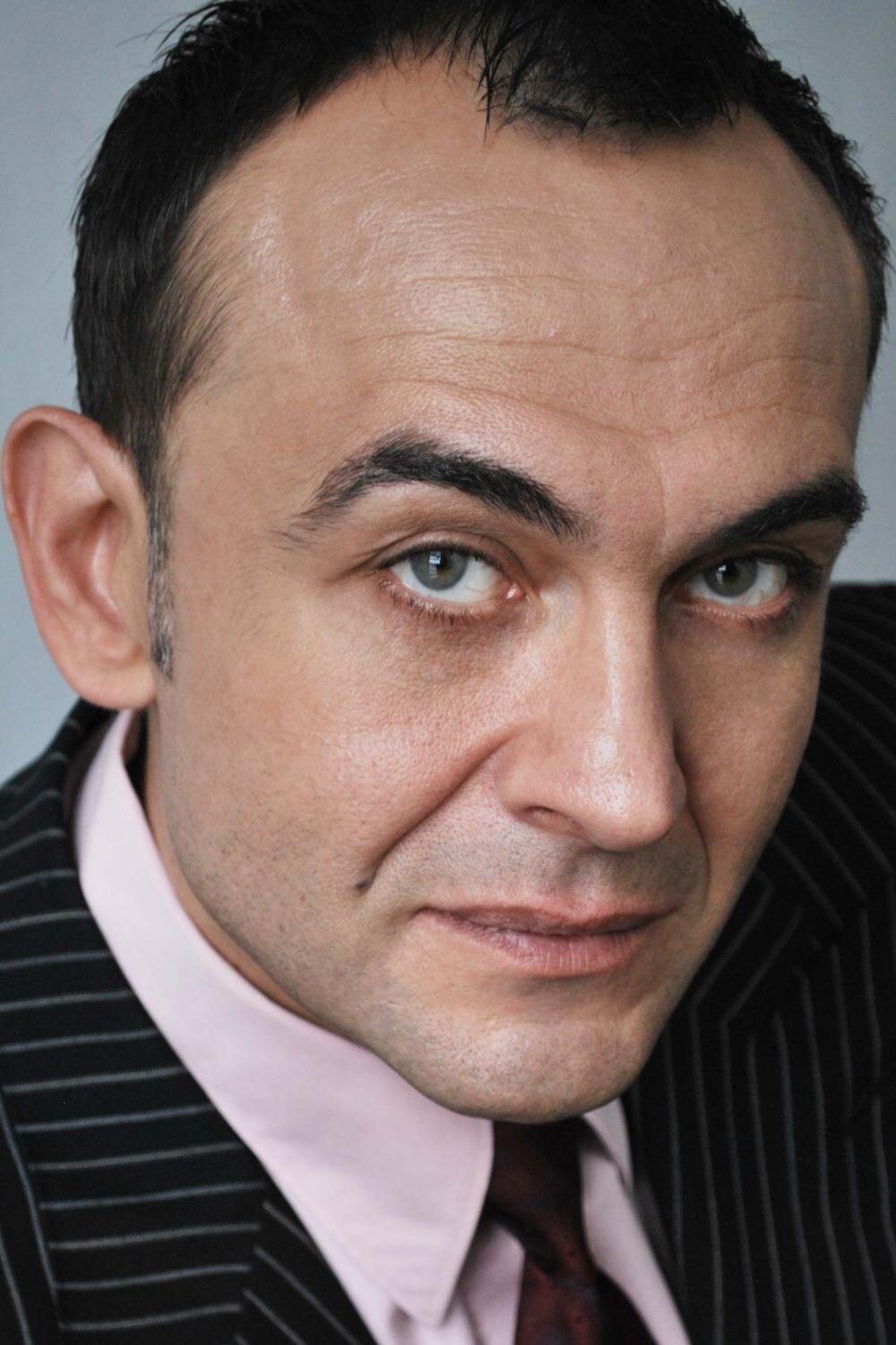 Misha Kuznetsov — Ozerov (Russian Interrogator)